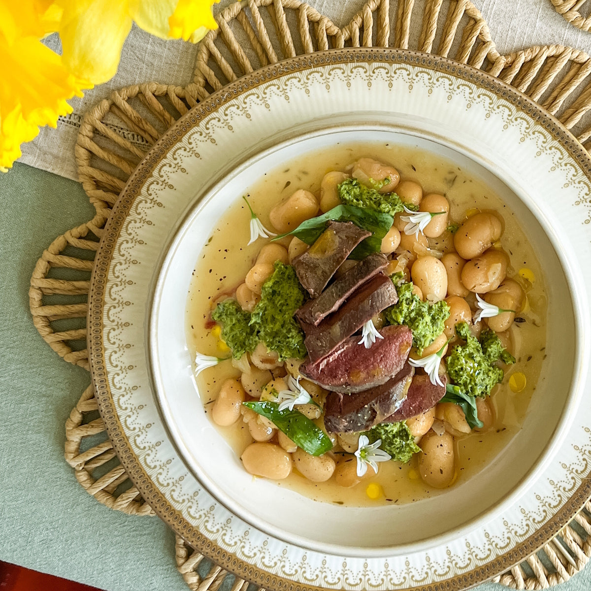 Ella Kitto's Pan-fried pigeon breast with creamy beans and Kentish wild garlic chimichurri
